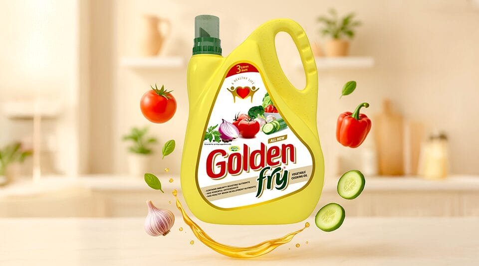 Golden Fry oil bottle with fresh vegetables in kitchen